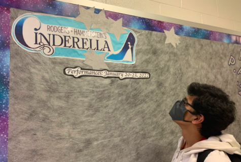 INSPIRATION In the fine arts hallway, Maanas Gokhale (10) looks at the poster put up for the musical. The cast list recently announced, Maanas found that he’d be an integral part to the production. “I am expecting great things from the department for this play,” said Maanas.