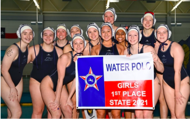 The Varsity Water Polo team shows their first place poster after a win against Southlake in the state championship.
