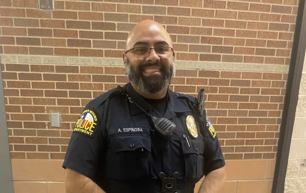 New SRO, Augusto Espinosa, posing for a picture in FMHS. Despite only being here for a short period of time so far, he has had many vape and explicit pictures issues. “vaping is something that we struggle with,” Espinosa said. 
