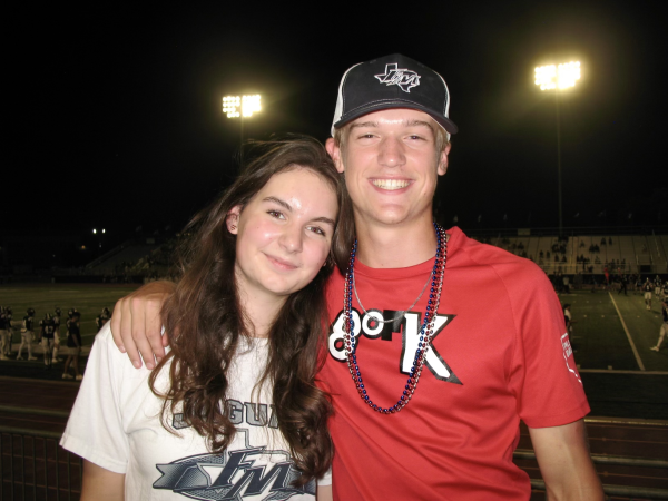 Laura Norman (12) and Ruben Beest (11) at the Flower Mound football game against Fossil Ridge. The Jags’ first game of the season was also the visiting students’ Norman and Beest’s first Texan football game. 